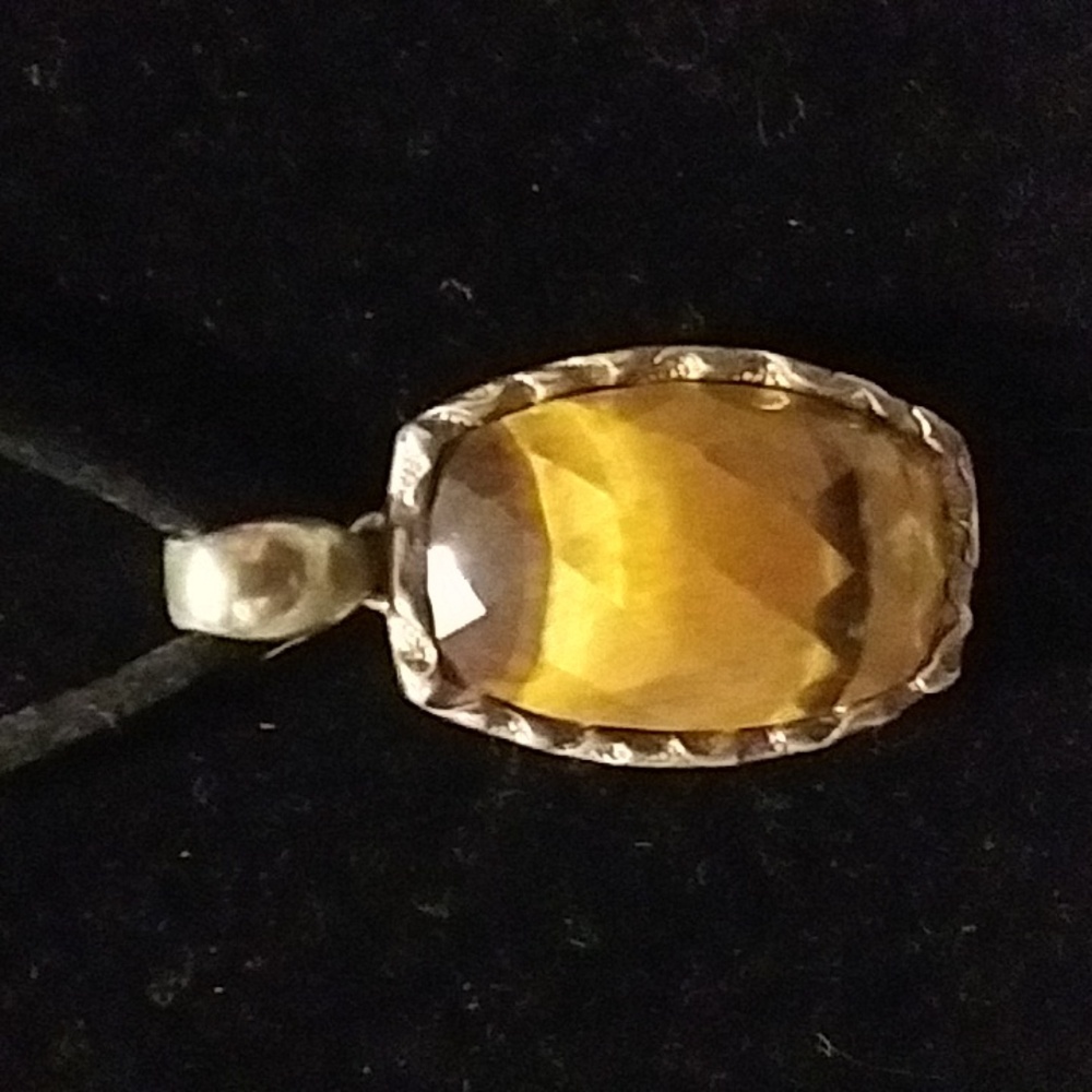 Tigers Eye Pendant On Black Cord